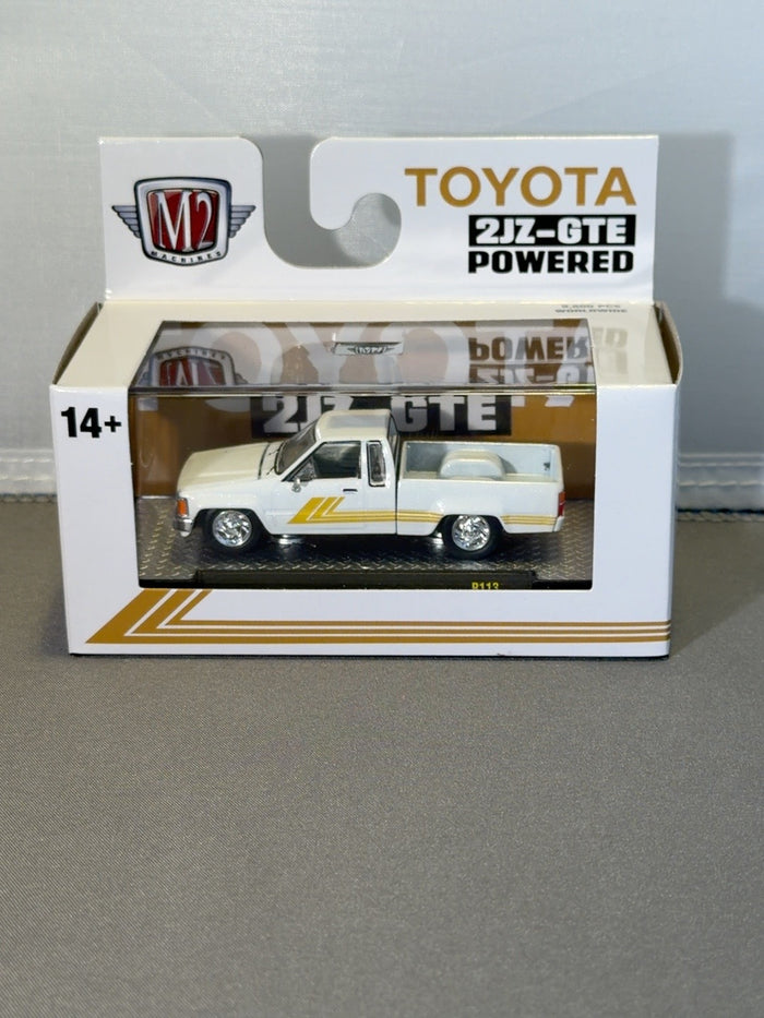M2 Machines 1985 Toyota Truck 2JZ-GTE Powered White Gold R113 1:64
