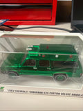 GreenLight 1983 Chevy Suburban K20 Ambulance Green Machine Chase 1:64 — front view