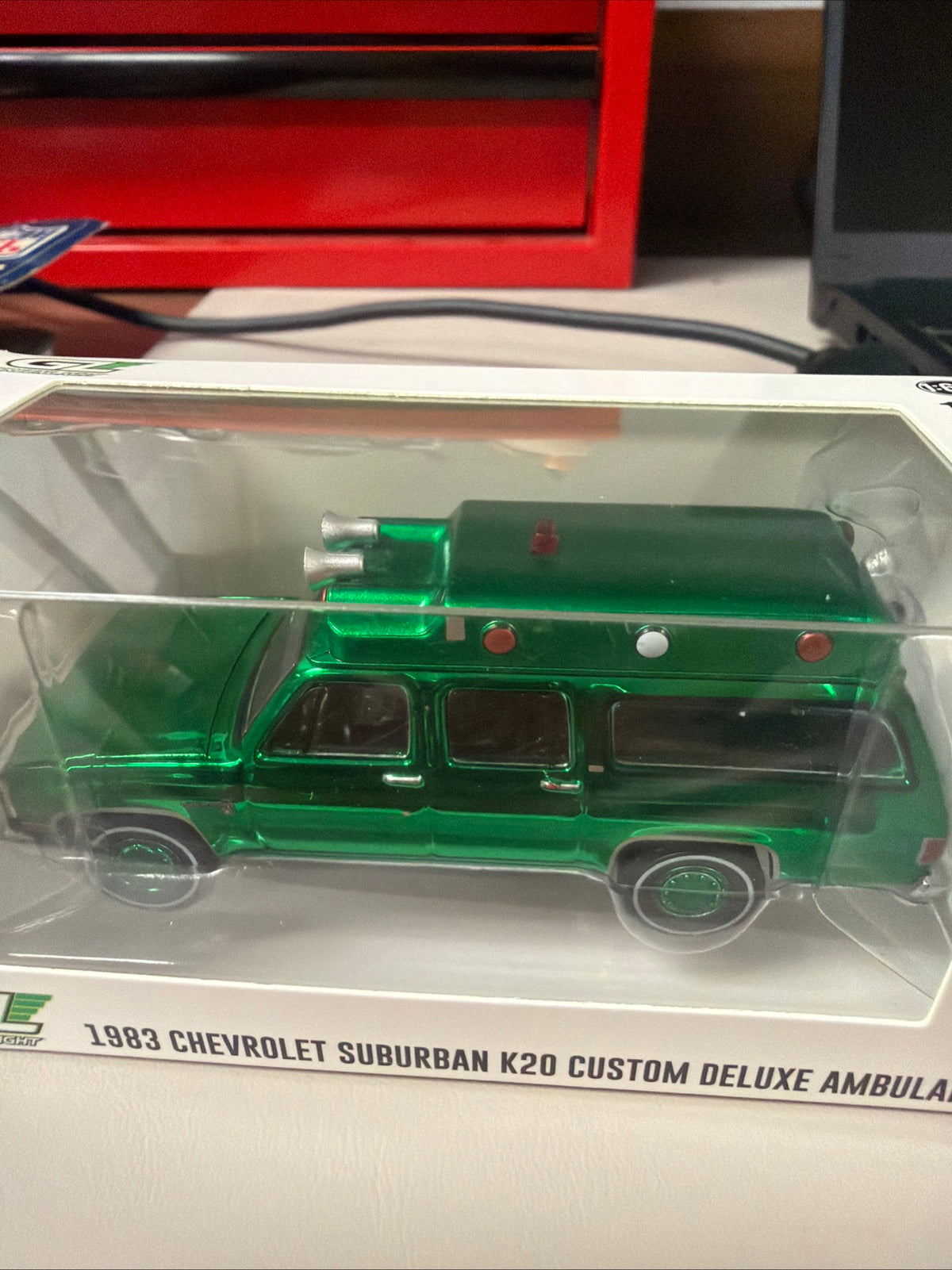 GreenLight 1983 Chevy Suburban K20 Ambulance Green Machine Chase 1:64 — front view