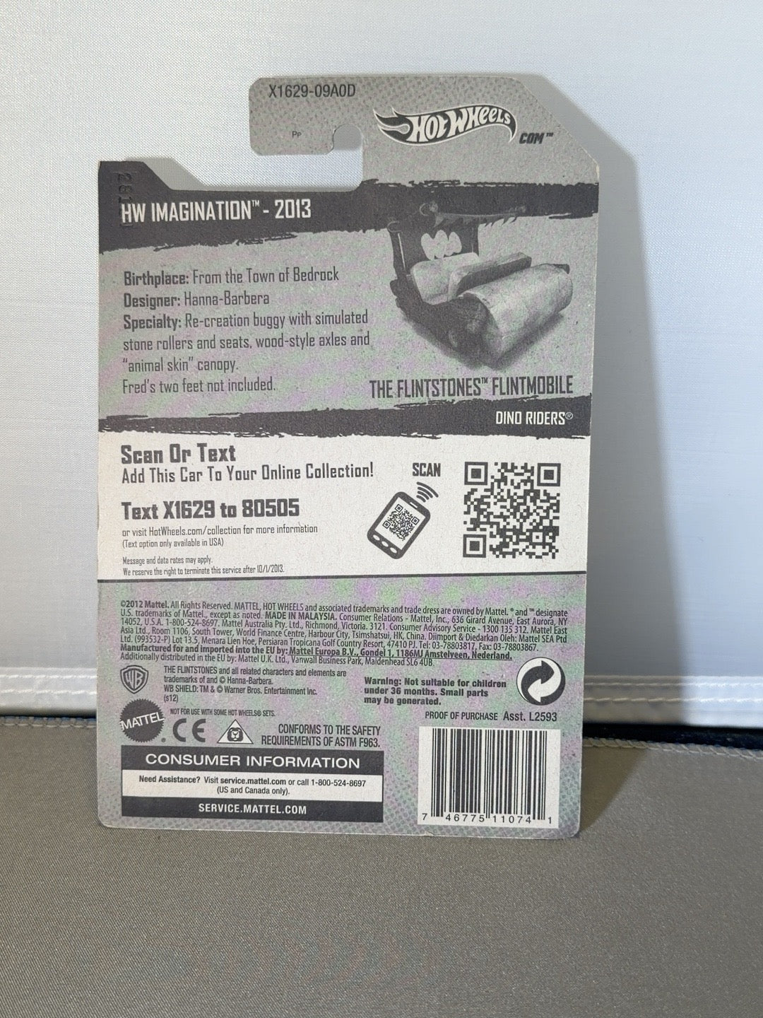 2013 Hot Wheels The Flintstones Flintmobile HW Imagination 70/250 X1629 — back of original packaging