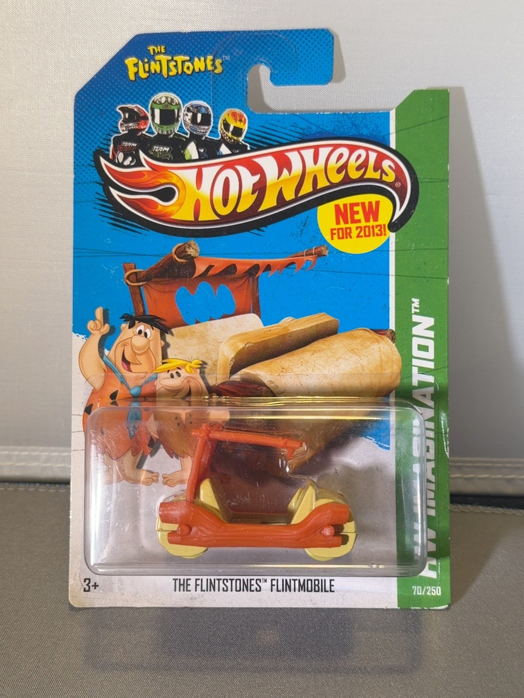 2013 Hot Wheels The Flintstones Flintmobile HW Imagination 70/250 X1629 — front of original packaging
