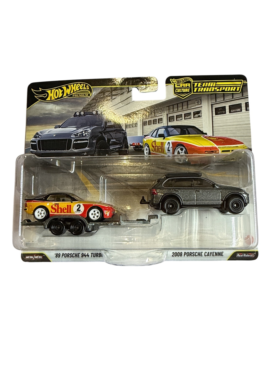 2026 Hot Wheels Premium Team Transport Porsche Shell '89 Porsche 944 Turbo and 2008 Porsche Cayenne JHX96 front