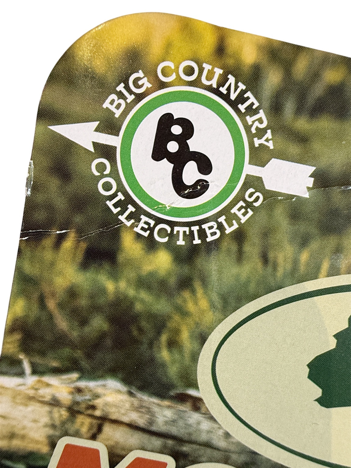 Close-up of upper card crease and wear on Auto World 1983 Chevy Silverado Mossy Oak package