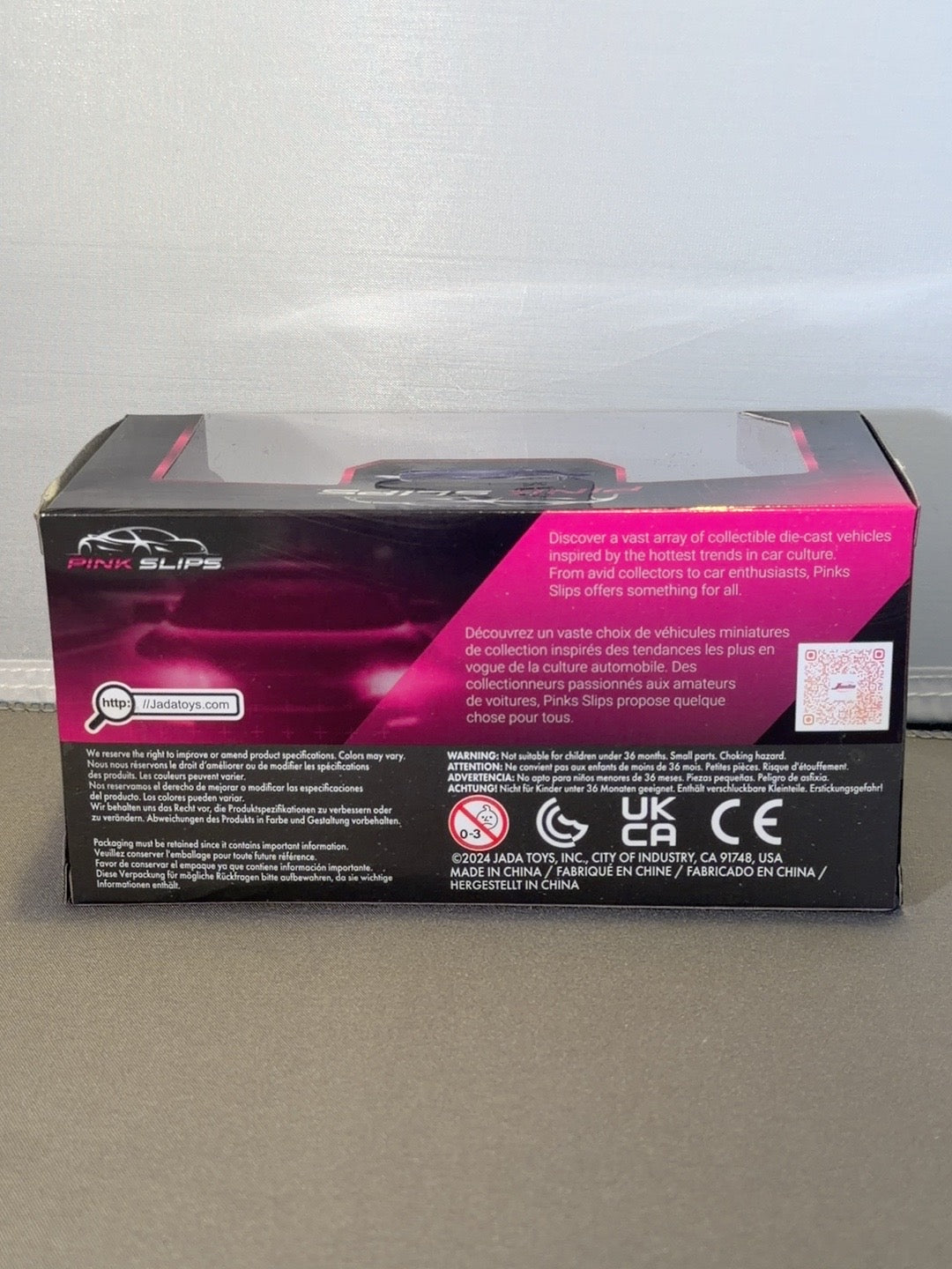 Original back photo Jada Pink Slips R34 packaging