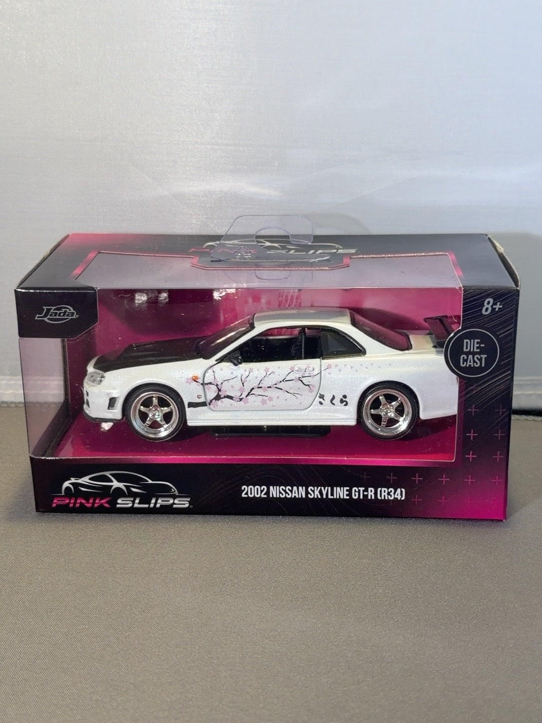 Original front photo Jada Pink Slips 2002 Nissan Skyline GT-R R34 Cherry Blossom