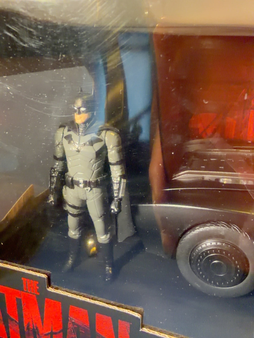 Batman figure detail in Jada Batmobile display box