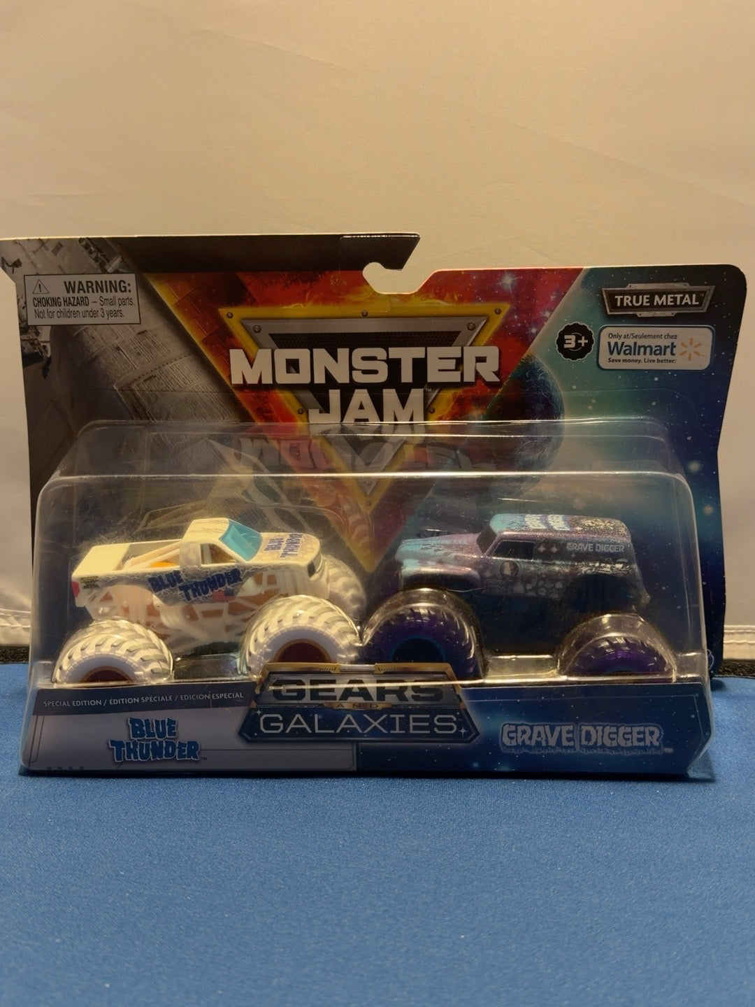 Monster Jam Gears and Galaxies Blue Thunder vs Grave Digger front