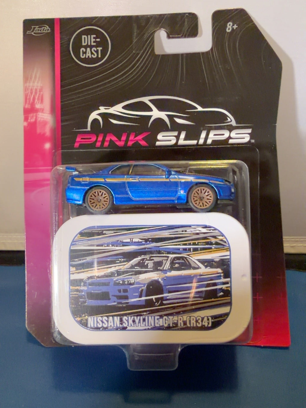Jada Pink Slips Nissan Skyline GT-R R34 Blue 1:64 with Collector Tin Sealed — product photo 1