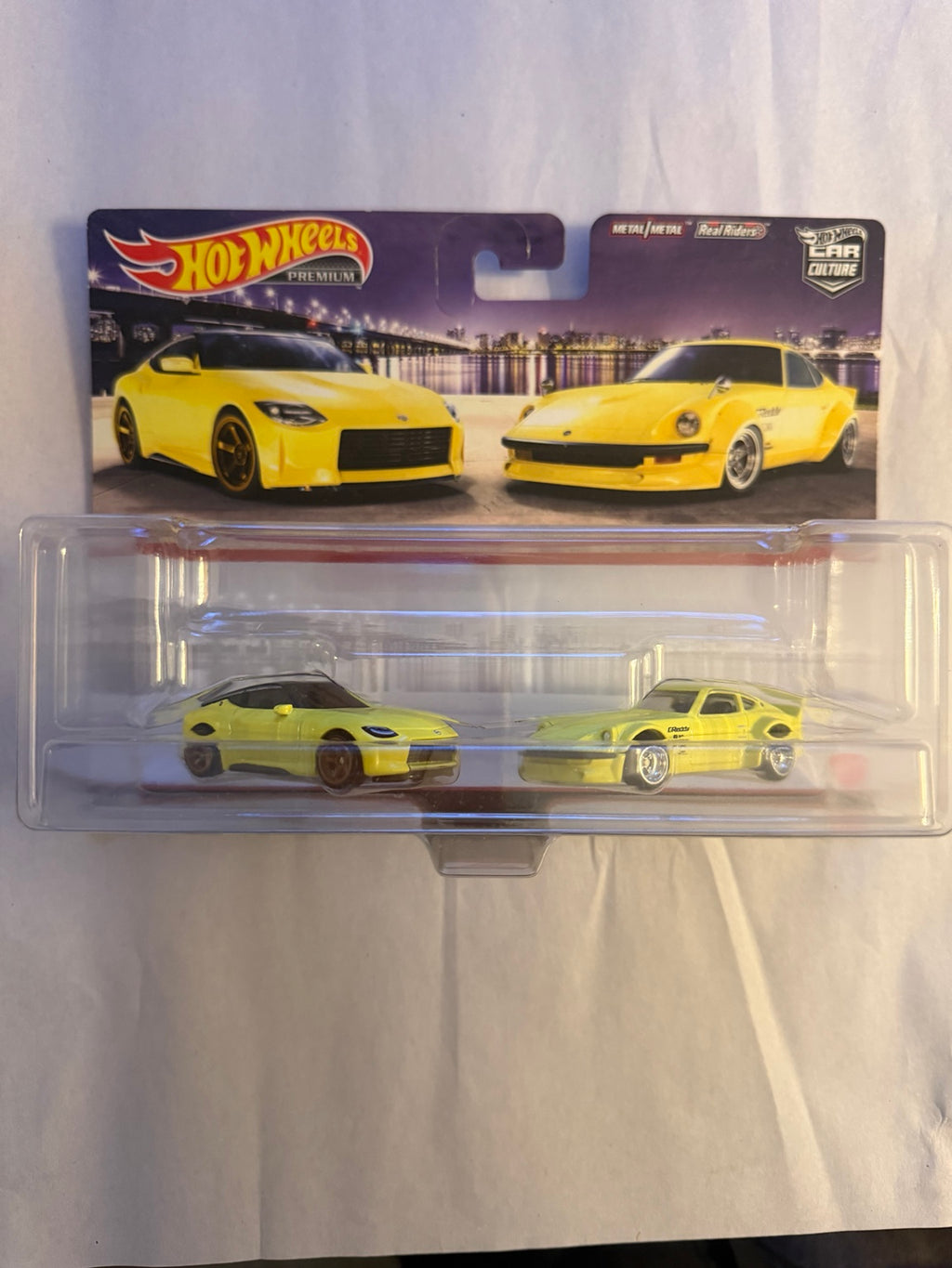 Yellow Nissan Z Proto and Fairlady Z sealed two-pack front