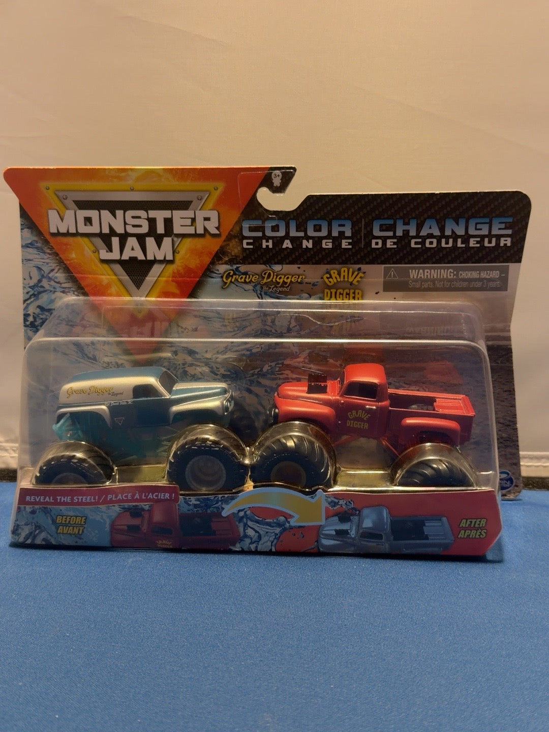 Monster Jam Reveal the Steel Grave Digger the Legend vs red Grave Digger front