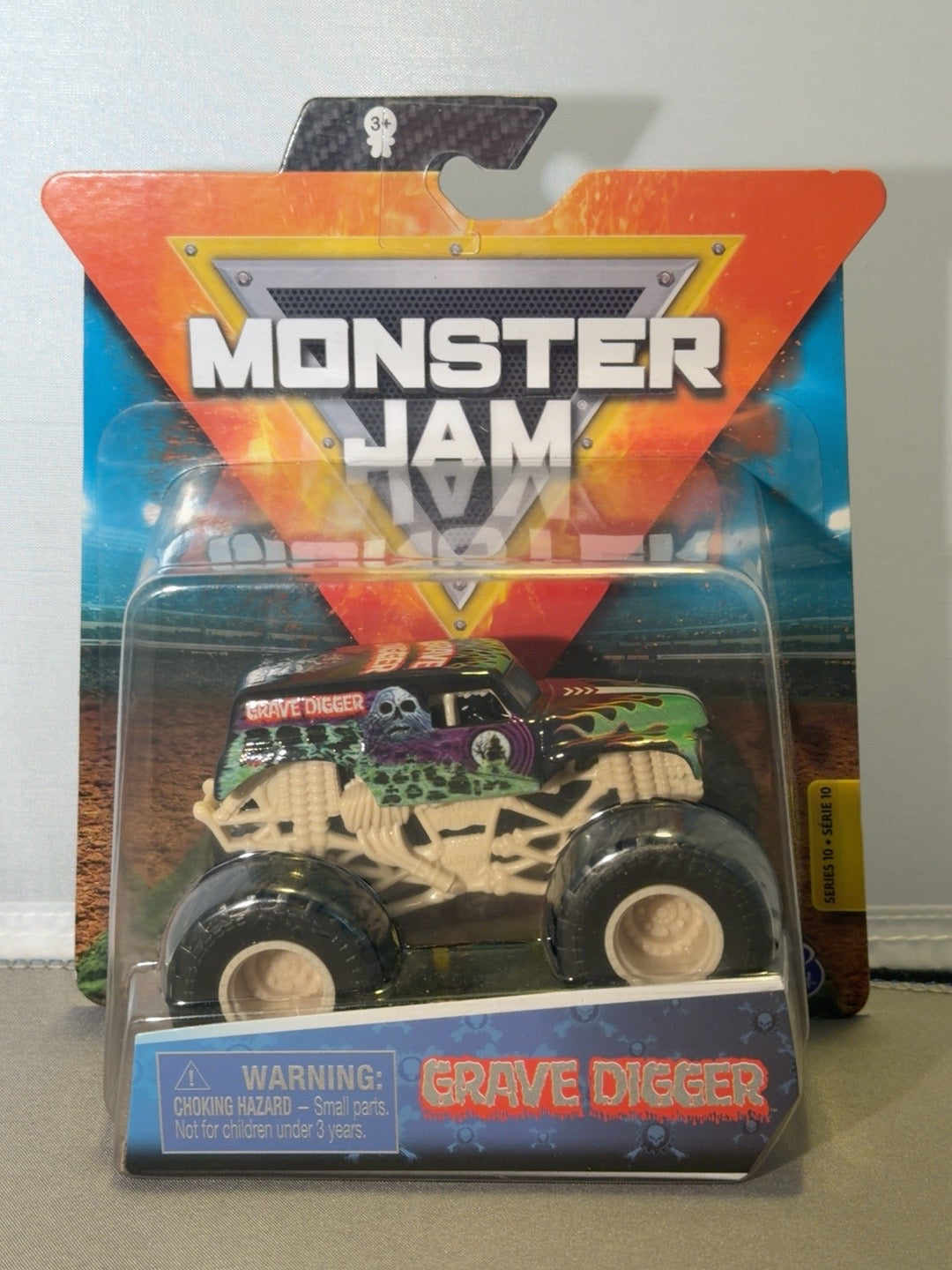 Original front photo of sealed Grave Digger Bone Yard Trucks Series 10